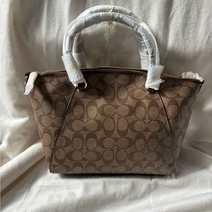 Brand new, never been used Kacey Satchel